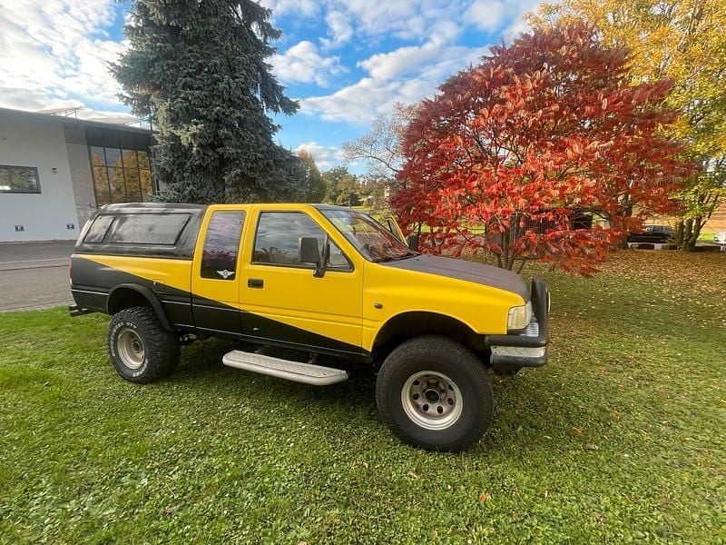 Gelb Gebraucht 1994 Opel Campo Abholung | 9.500 € - Bild 1/4