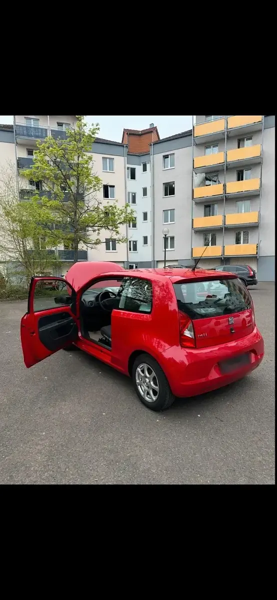 Używany Seat Mii 60 KM (44 kW) 2013 Czerwony Hatchback