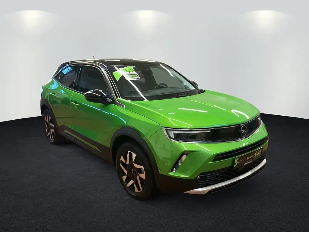 Gebraucht Opel Mokka Elegance 101 PS (74 kW) 2022 Matcha green/ikone gruen (metallic) SUV