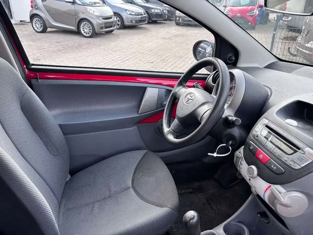 Gebraucht Toyota Aygo Cool 68 PS (50 kW) 2006 Rot Kleinwagen