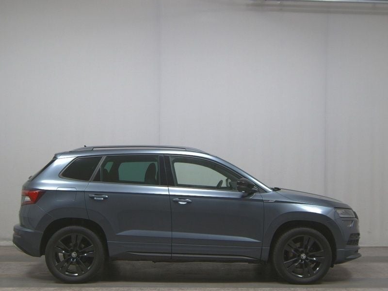Grau Gebraucht 2019 Skoda Karoq LAURIN & KLEMENT SUV | 21.980 € (Fairer Preis) - Bild 1/4