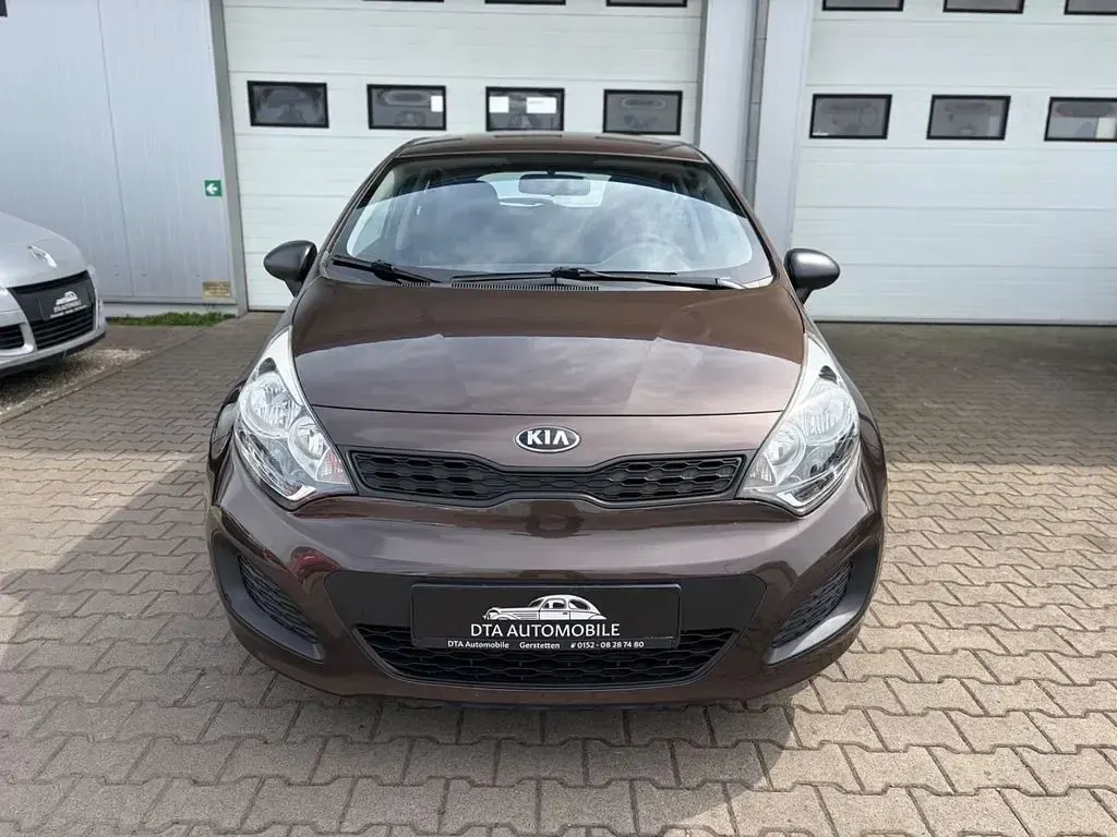 Gebraucht Kia Rio 86 PS (63 kW) 2012 Braun Limousine
