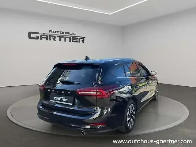 Gebraucht Ford Focus Titanium 125 PS (91 kW) 2024 Obsidianschwarz Kombi