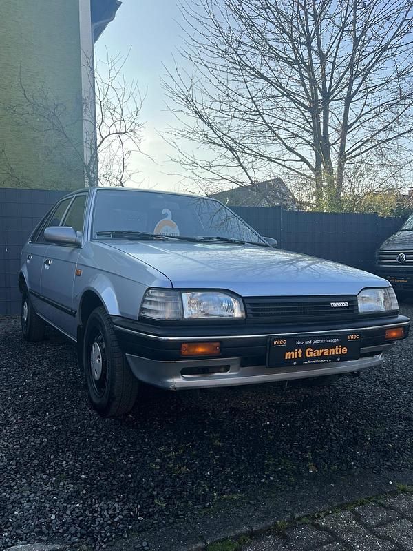 Gebraucht Mazda 323 60 PS (44 kW) 1989 Silber Kleinwagen