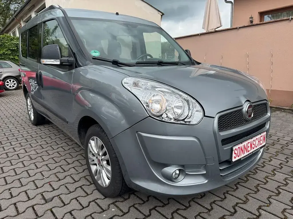 Gebraucht Fiat Doblò Emotion 95 PS (69 kW) 2010 Grau Van / Kleinbus