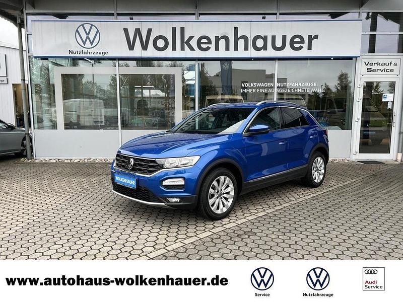 Ravennablau (metallic) Gebraucht 2021 VW T-Roc Sportline SUV | 21.890 € (Fairer Preis) - Bild 1/4