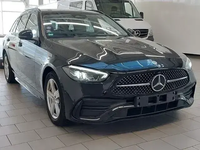 Gebraucht Mercedes C300e AMG 319 PS (234 kW) 2023 Schwarz/baltic black Kombi
