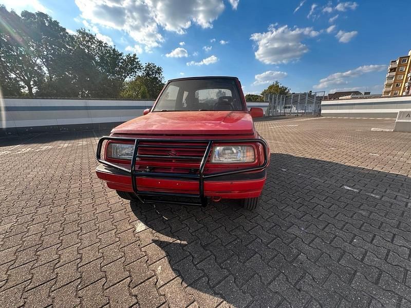 Rot Gebraucht 1992 Suzuki Vitara SUV | 2.600 € - Bild 1/4