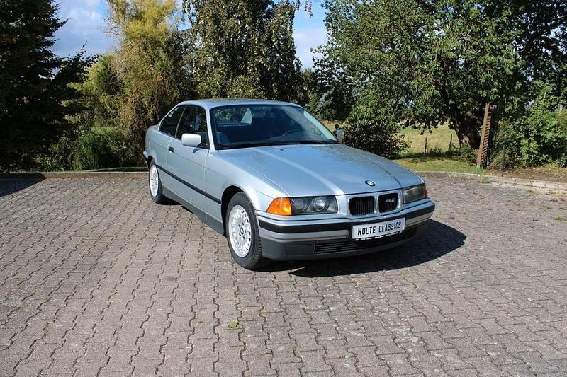 Silber Gebraucht 1993 BMW 320 Coupé | 9.890 € - Bild 1/4