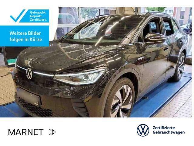 Grenadillschwarz metallic Gebraucht 2023 VW ID.4 Pro Performance SUV | 33.930 € (Fairer Preis) - Bild 1/2