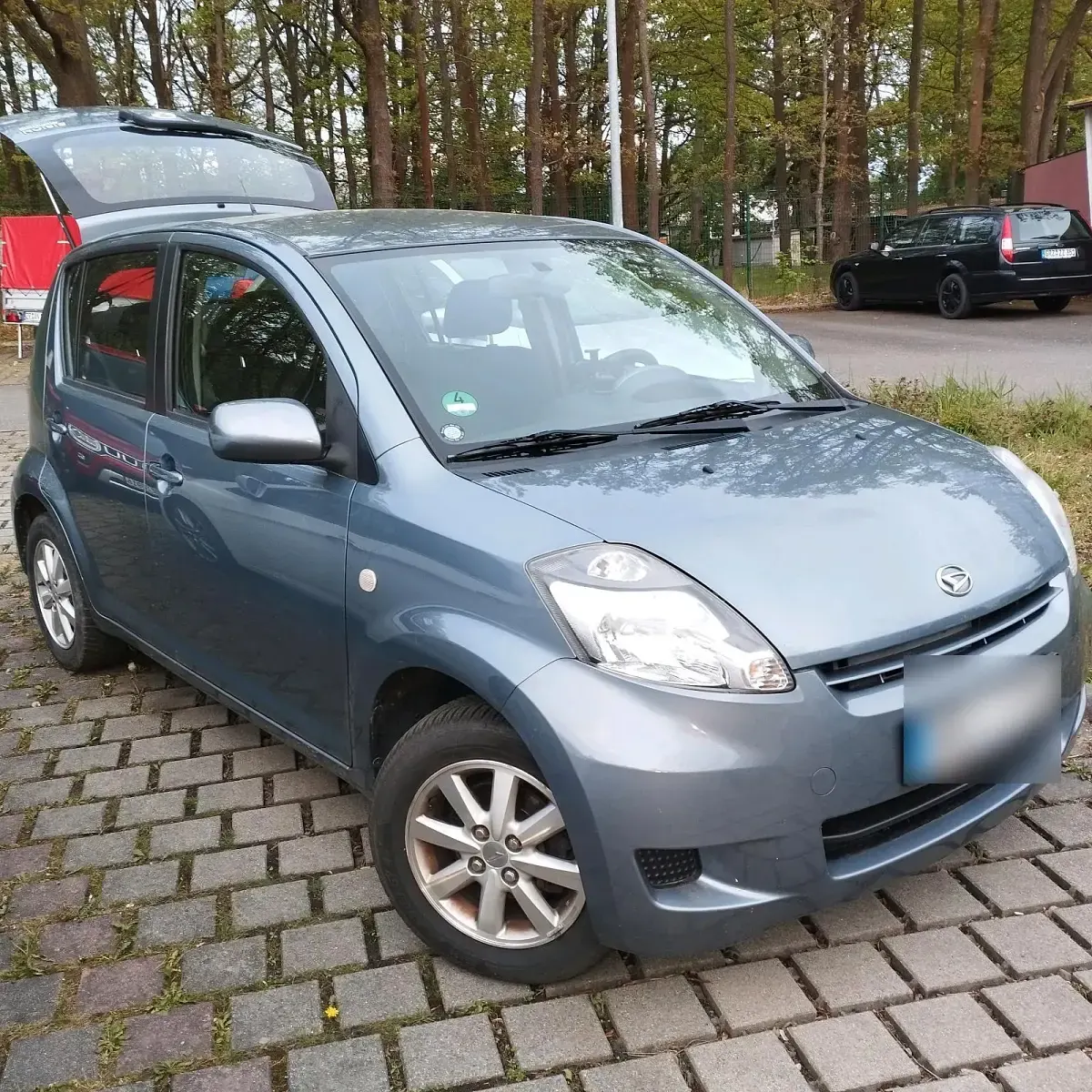 Gebraucht Daihatsu Sirion 91 PS (66 kW) 2011 Grau Kleinwagen