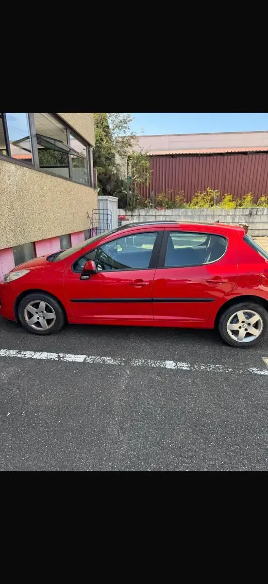 Gebraucht Peugeot 207 73 PS (53 kW) 2010 Rot Kleinwagen