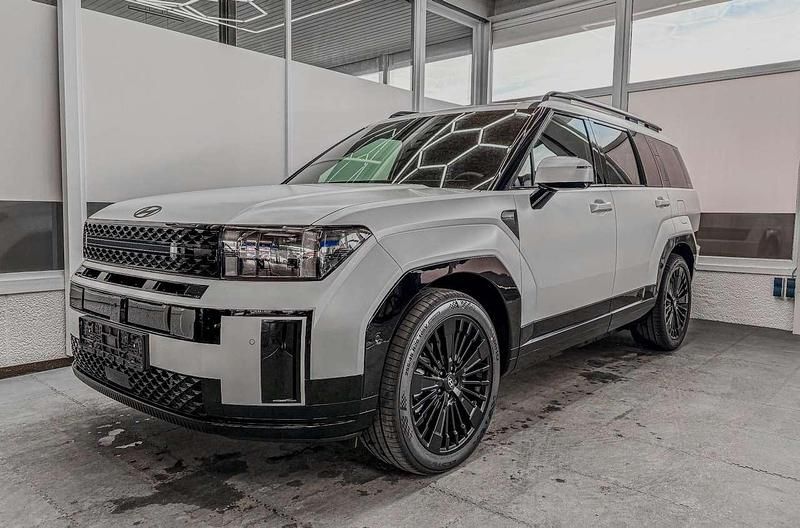 Creamy white matt wwm Neu 2025 Hyundai Santa Fe SUV | 55.490 € (Fairer Preis) - Bild 1/4