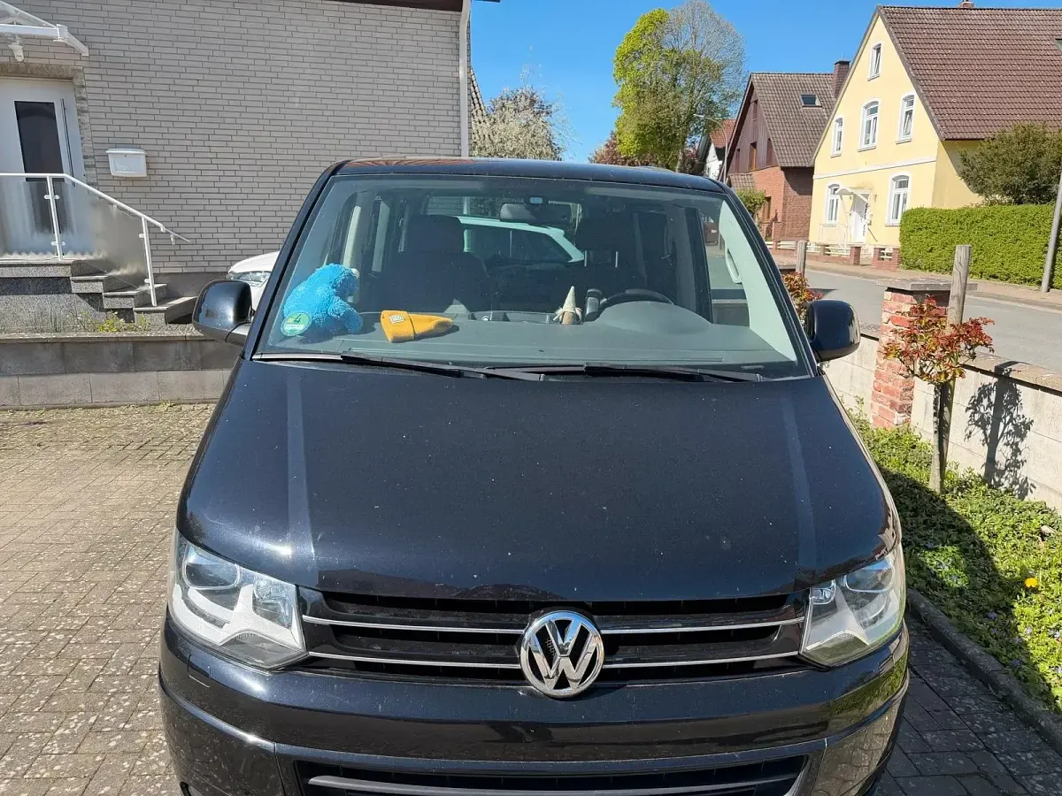 Używany VW Caravelle 180 KM (132 kW) 2013 Czarny Van
