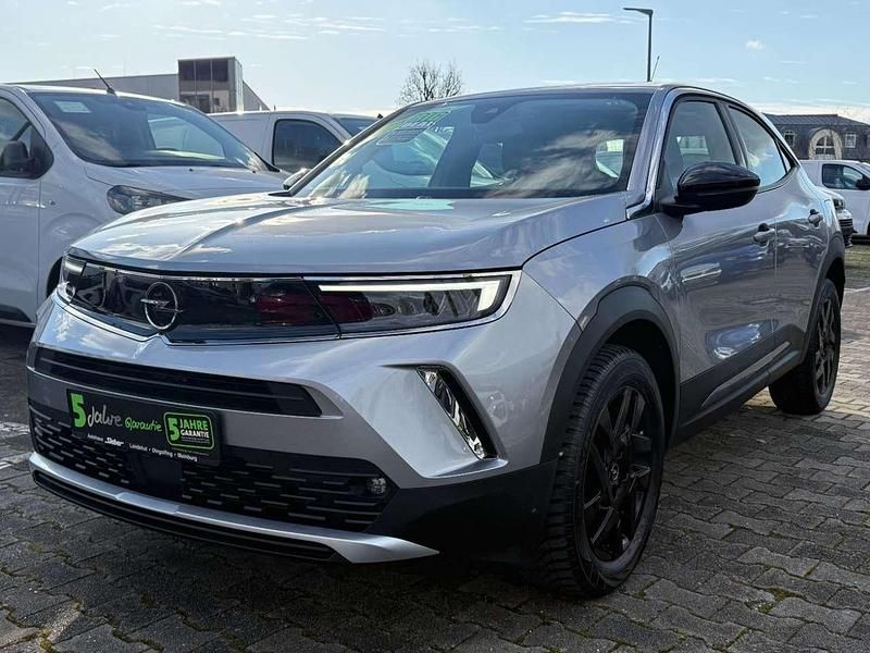 Gebraucht Opel Mokka Elegance 131 PS (96 kW) 2022 Kontrast grau/quarz silber SUV