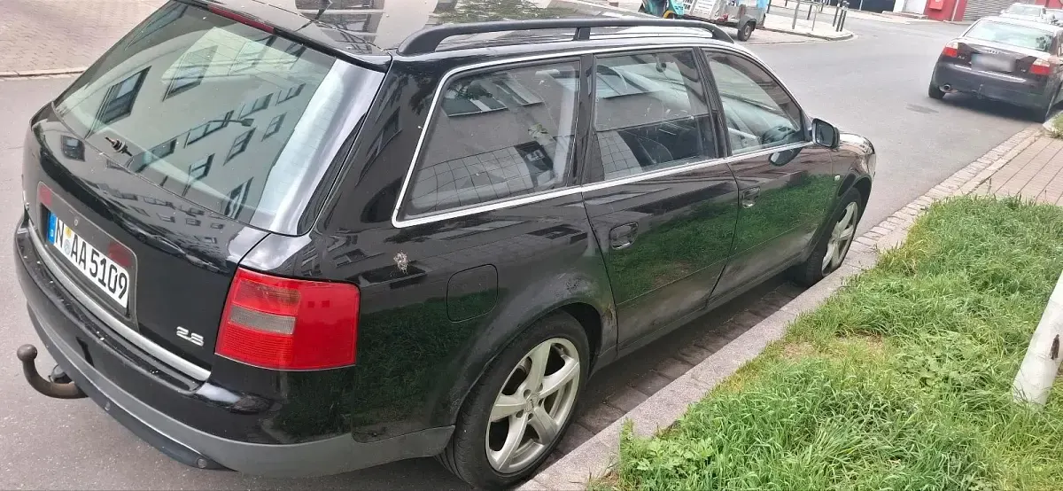 Używany Audi A6 193 KM (141 kW) 1999 Czarny Kombi
