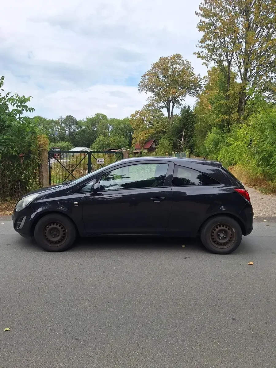 Gebraucht Opel Corsa 68 PS (50 kW) 2014 Schwarz Kleinwagen