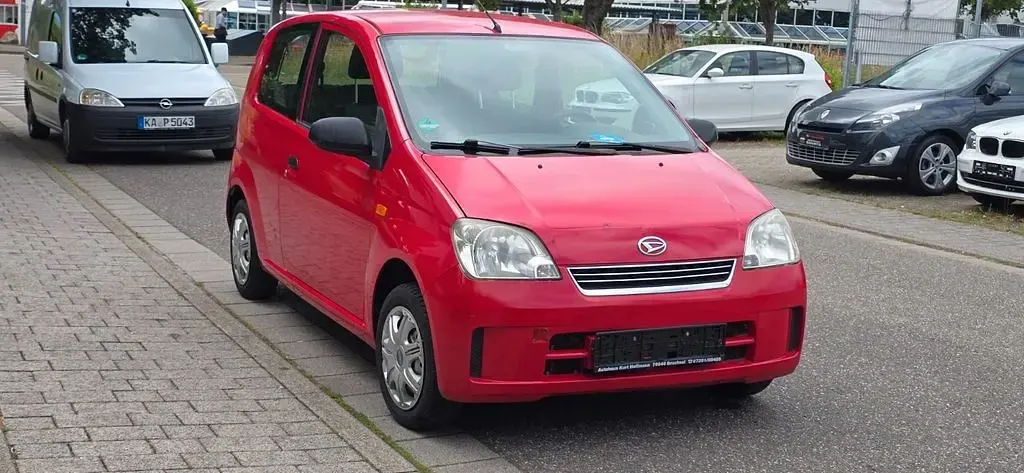 Gebraucht Daihatsu Cuore 58 PS (42 kW) 2005 Rot Kleinwagen
