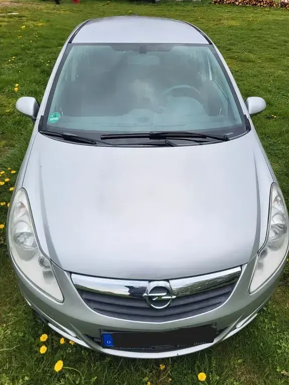 Używany Opel Corsa Eco 86 KM (63 kW) 2010 Srebrny Hatchback