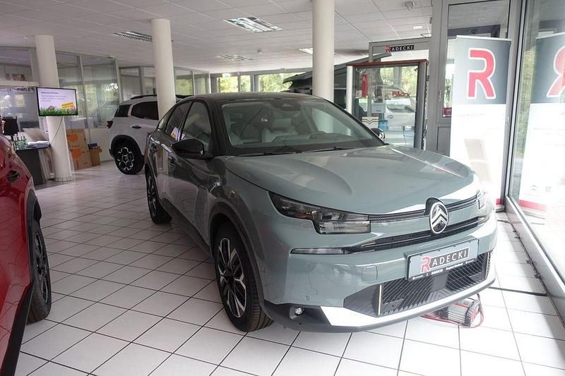 Grün Neu 2025 Citroën e-C4 Limousine | 37.490 € (Teuer) - Bild 1/4