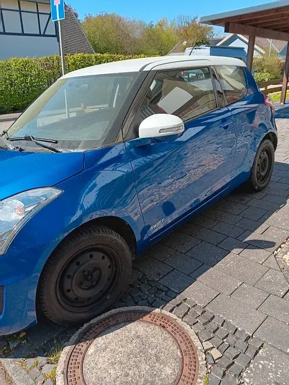Gebraucht Suzuki Swift 94 PS (69 kW) 2014 Blau Kleinwagen
