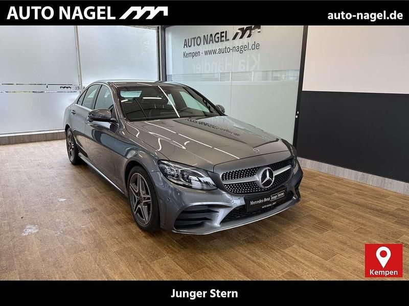 Grau Gebraucht 2020 Mercedes C180 AMG Limousine | 31.376 € (Etwas zu teuer) - Bild 1/4