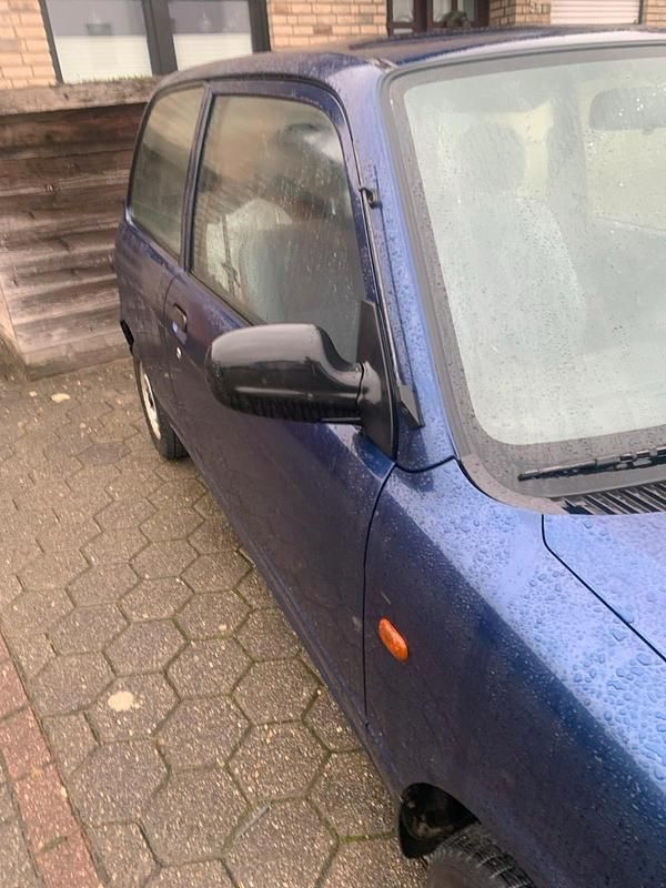 Gebraucht Daihatsu Cuore 56 PS (41 kW) 1999 Blau Kleinwagen