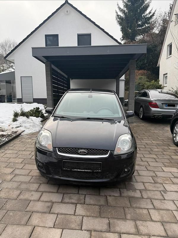 Gebraucht Ford Fiesta Ambiente 70 PS (51 kW) 2007 Schwarz Kleinwagen