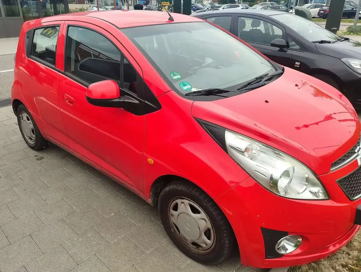 Second-hand Chevrolet Spark 68 CP (50 kW) 2011 Roșu Hatchback