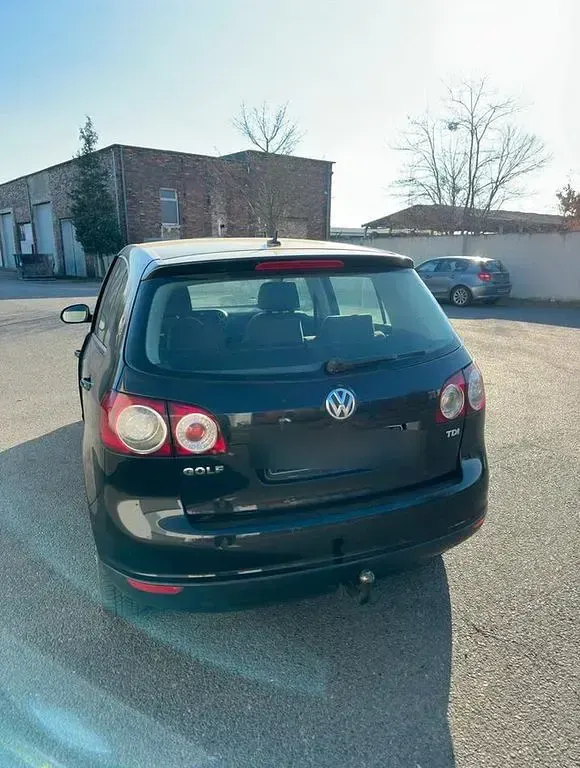Używany VW Golf 105 KM (77 kW) 2006 Czarny Minivan