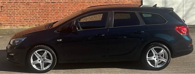 Gebraucht Opel Astra 110 PS (80 kW) 2016 Grün Kombi