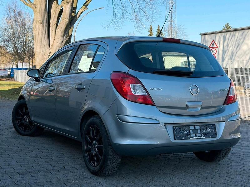 Używany Opel Corsa Satellite 75 KM (55 kW) 2011 Srebrny Hatchback