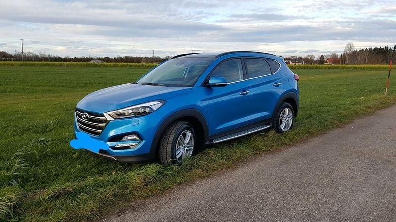 Blau Gebraucht 2015 Hyundai Tucson Premium SUV | 14.990 € (Guter Preis) - Bild 1/4