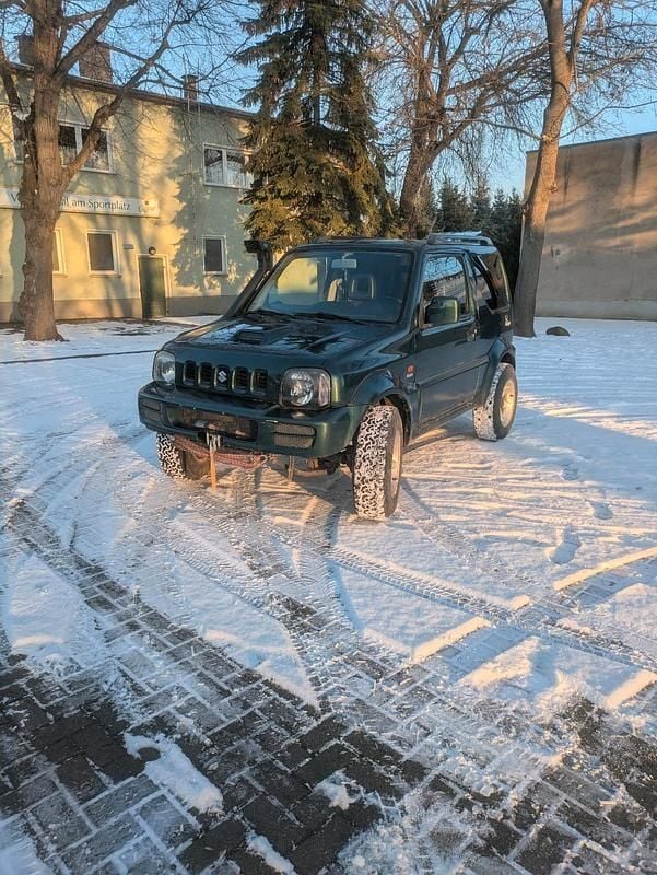 Grün Gebraucht 2006 Suzuki Jimny SUV | 4.500 € (Fairer Preis) - Bild 1/4