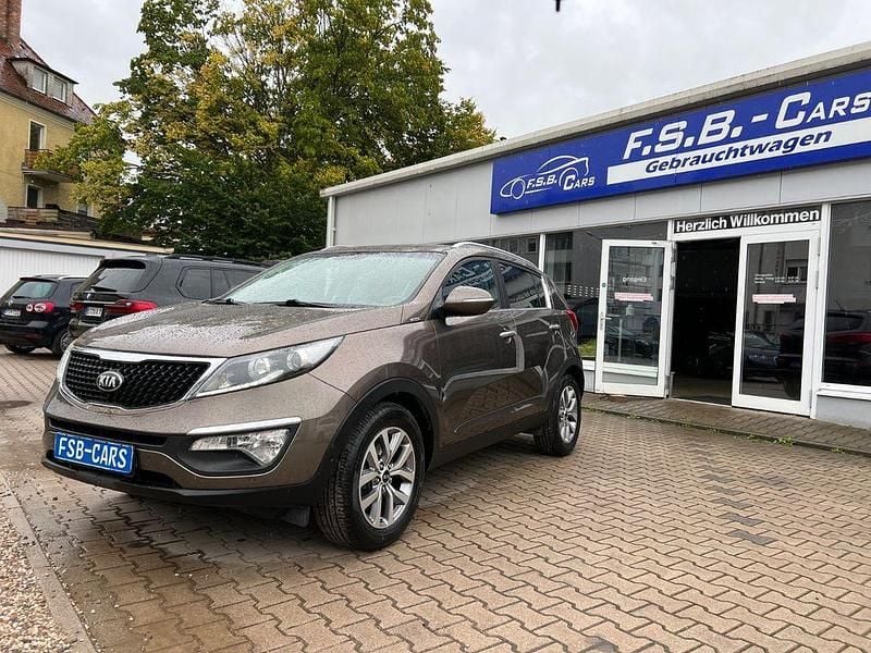 Braun Gebraucht 2015 Kia Sportage DREAM-TEAM Edition SUV | 10.650 € (Fairer Preis) - Bild 1/4