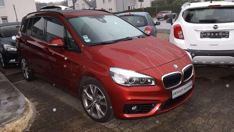 Gebraucht BMW 218 Sport Line 150 PS (110 kW) 2015 Flamencorot brillanteffekt Van / Kleinbus