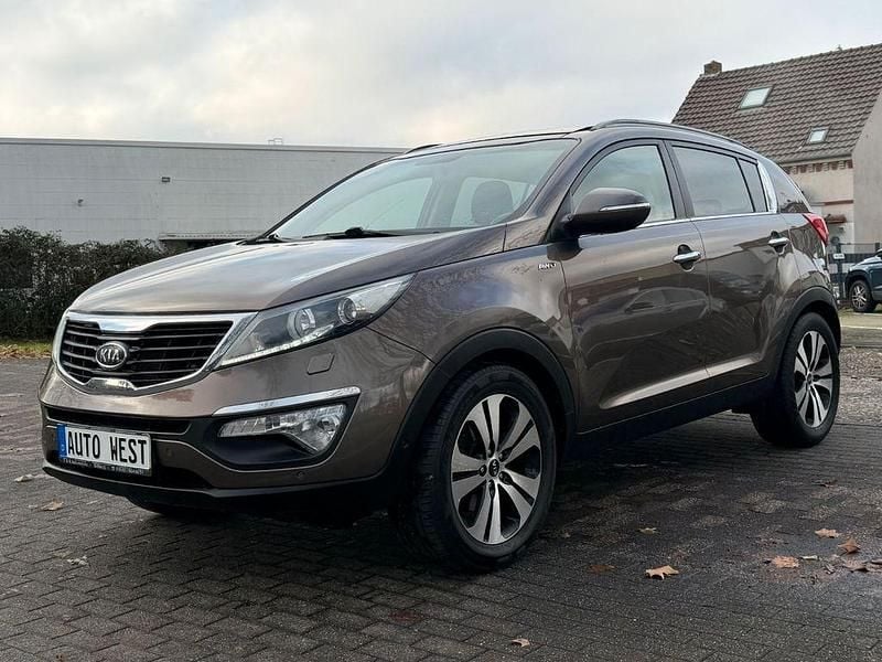 Braun Gebraucht 2012 Kia Sportage Spirit SUV | 9.790 € (Fairer Preis) - Bild 1/4