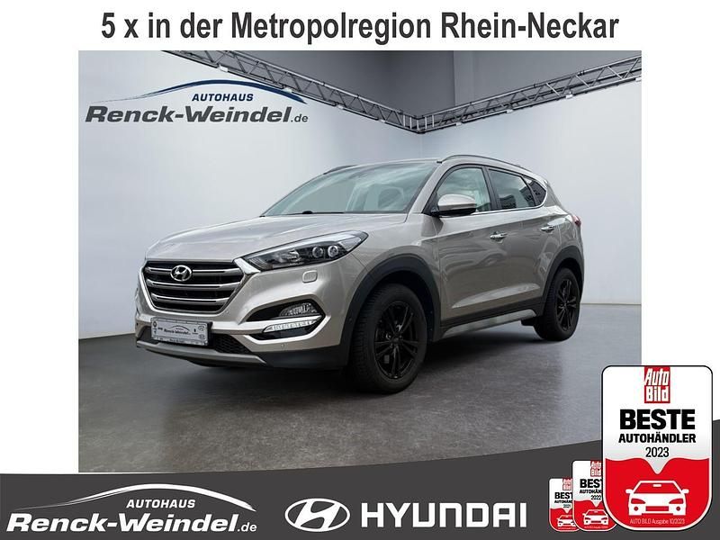 Weiss Gebraucht 2017 Hyundai Tucson Premium SUV | 18.489 € (Fairer Preis) - Bild 1/4