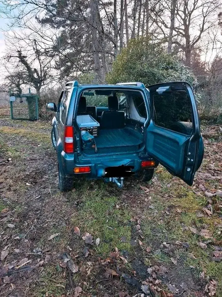 Second-hand Suzuki Jimny 86 CP (63 kW) 2014 Gri SUV