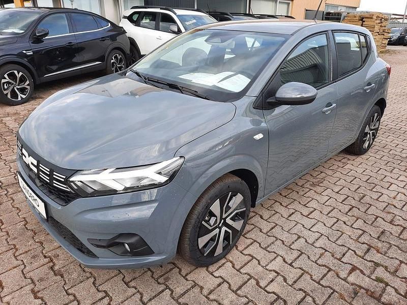 Grau Neu 2025 Dacia Sandero Expression Kleinwagen | 16.439 € (Guter Preis) - Bild 1/4