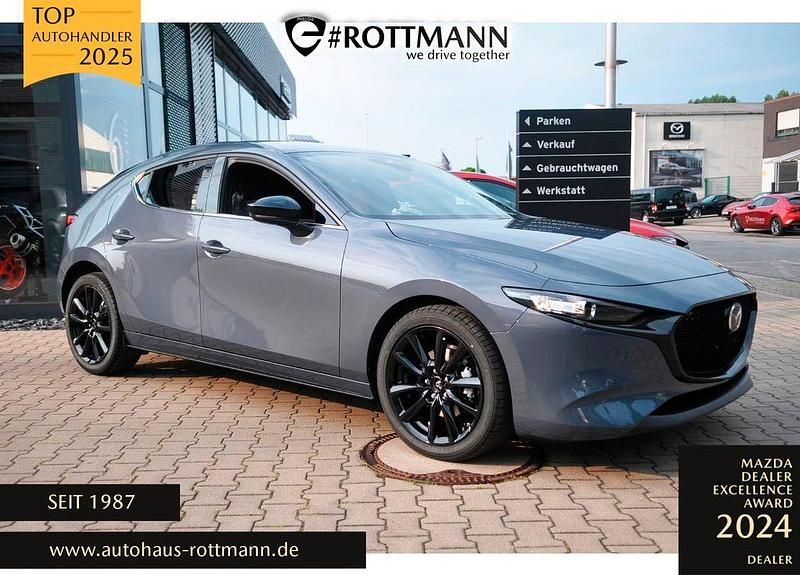 Grau Gebraucht 2024 Mazda 3 Homura-Line Limousine | 26.880 € (Fairer Preis) - Bild 1/4