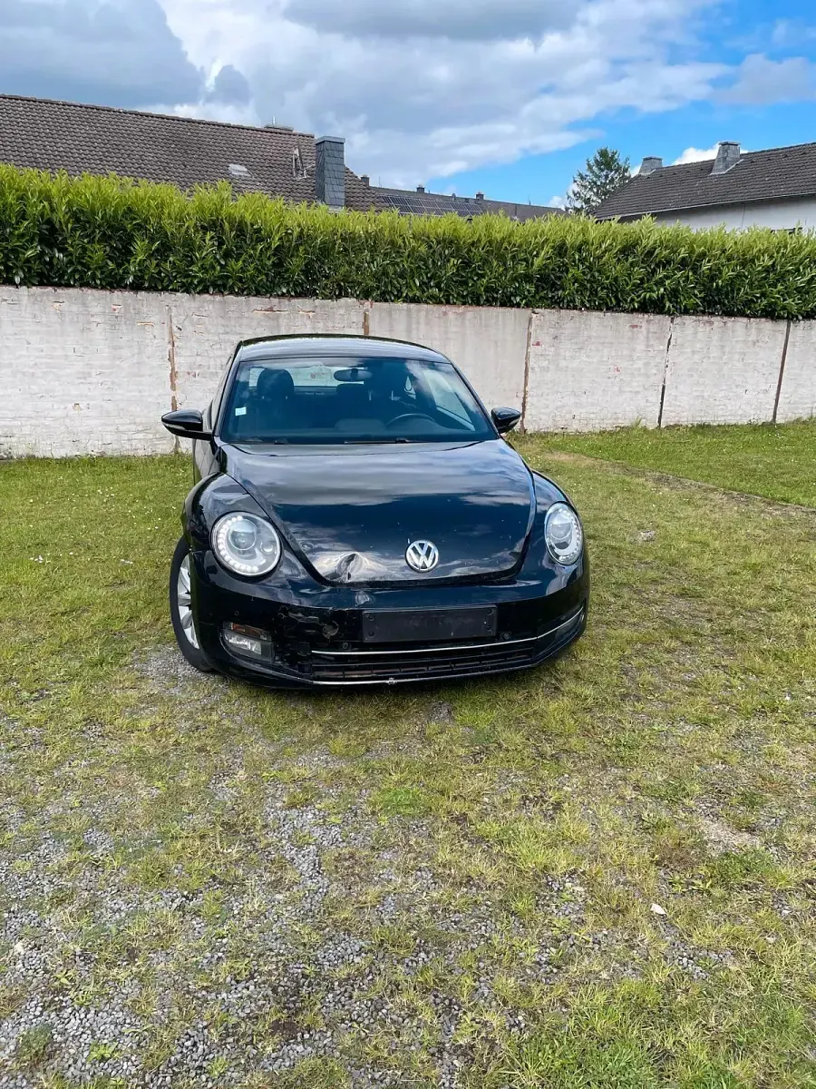 Używany VW Beetle 105 KM (77 kW) 2012 Czarny Hatchback
