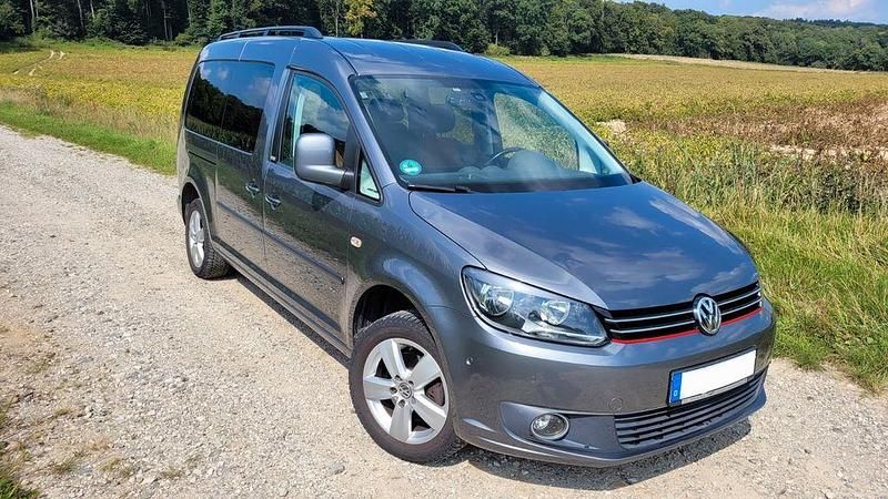 Grau Gebraucht 2013 VW Caddy Maxi Comfortline Van / Kleinbus | 10.900 € (Fairer Preis) - Bild 1/4