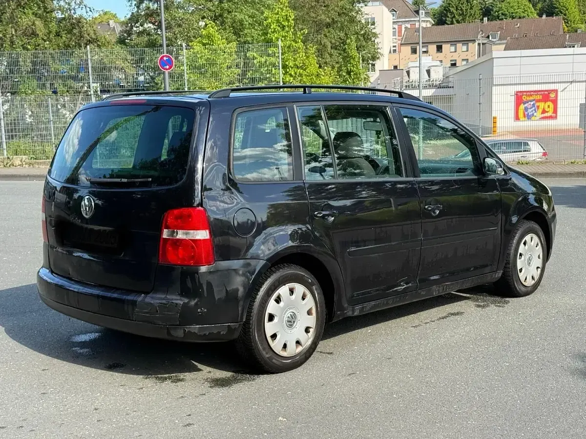 Używany VW Touran 116 KM (85 kW) 2007 Czarny Minivan