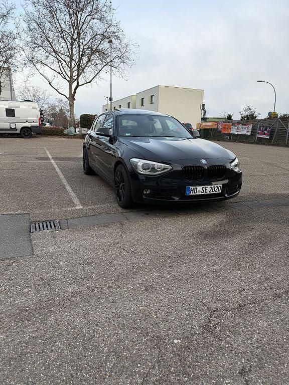 Schwarz Gebraucht 2012 BMW 125 Sport Line Kleinwagen | 12.500 € - Bild 1/4