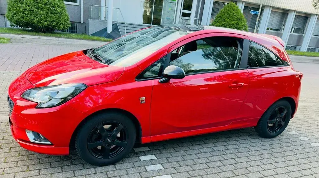 Usado Opel Corsa Color Edition 101 HP (74 kW) 2015 Vermelho Citadino
