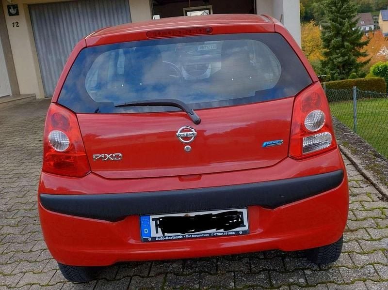 Rot Gebraucht 2010 Nissan Pixo Acenta Kleinwagen | 3.400 € (Fairer Preis) - Bild 1/4