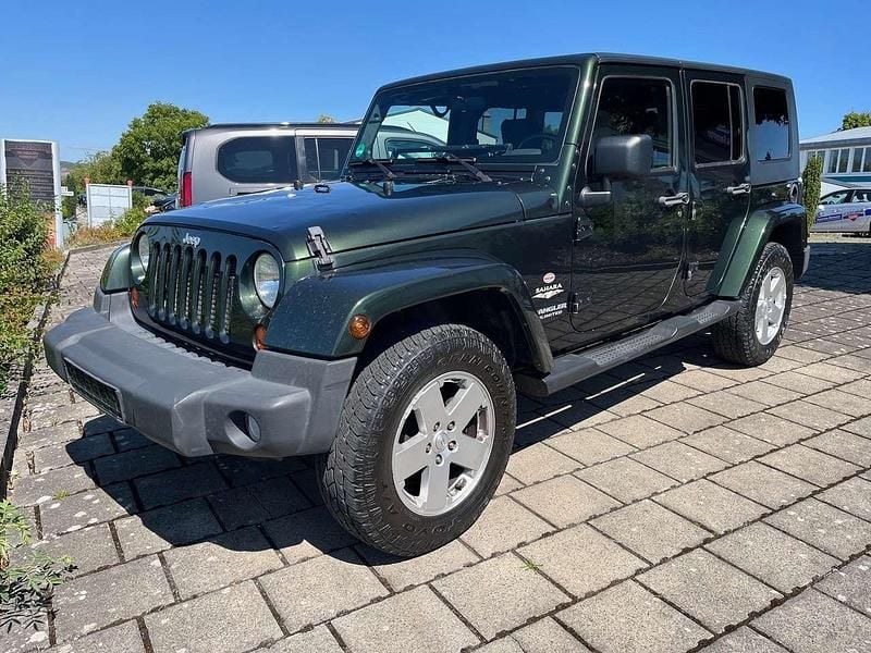 Grün Gebraucht 2011 Jeep Wrangler Sahara SUV | 15.900 € (Superpreis) - Bild 1/4