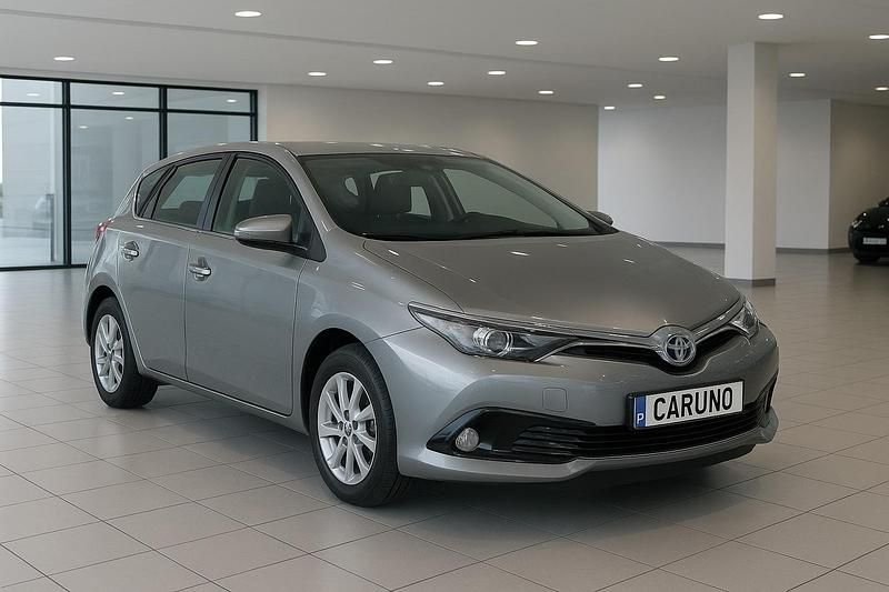 Grau Gebraucht 2016 Toyota Auris Hybrid Limousine | 10.490 € - Bild 1/4