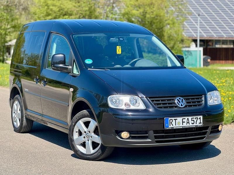 Second-hand VW Caddy Team 105 CP (77 kW) 2010 Negru Monovolum